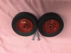 2 red deck wheels and bolts